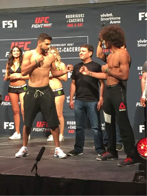 Brennan Smith | The Salt Lake Tribune

Main event fighters Yair Rodriguez and Alex Caceres pose after their UFC Fight Night 92 weigh in.