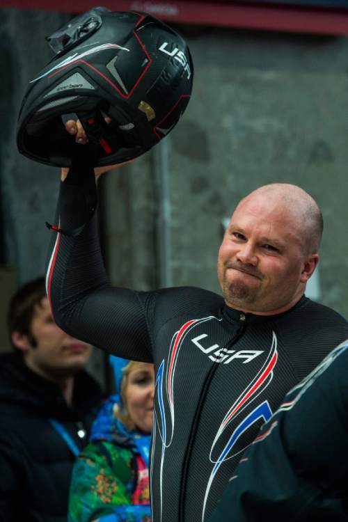 KRASNAYA POLYANA, RUSSIA  - JANUARY 17:
Pilot Steven Holcomb celebrates after competing in the men's two-man bobsled at Sanki Sliding Center during the 2014 Sochi Olympics Monday February 17, 2014. USA-1 with Steven Holcomb, of Park City, Utah, and Steve Langton, of Melrose, Mass., won the bronze medal with a time of 3:46.27.
(Photo by Chris Detrick/The Salt Lake Tribune)