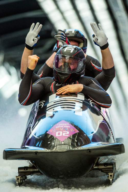 KRASNAYA POLYANA, RUSSIA  - JANUARY 23:
Night Train 2, piloted by Steven Holcomb and pushed by Chris Fogt, Curtis Tomasevicz, Steve Langton, celebrate at the finish of the four-man bobsled at Sanki Sliding Center during the 2014 Sochi Olympics Sunday February 23, 2014. The team won the bronze medal with a cumulative time of 3:40.99. 
(Photo by Chris Detrick/The Salt Lake Tribune)