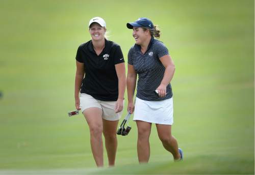 Scott Sommerdorf   |  The Salt Lake Tribune  
Lea Garner, left, and Kendra Dalton laugh as they walk up to the 13th green during the 2016 Utah Women's State Amateur golf tournament at Victory Ranch Golf Club in Francis, Friday, August 5, 2016. Dalton won the match over Garner - both team mates at BYU.