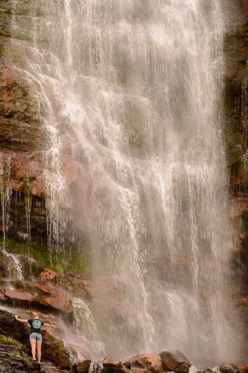 Trent Nelson  |  The Salt Lake Tribune
Hikers cool off at Bridal Veil Falls in Provo, Friday August 5, 2016.