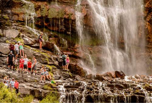 Trent Nelson  |  The Salt Lake Tribune
Hikers cool off at Bridal Veil Falls in Provo, Friday August 5, 2016.