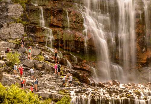 Trent Nelson  |  The Salt Lake Tribune
Hikers cool off at Bridal Veil Falls in Provo, Friday August 5, 2016.