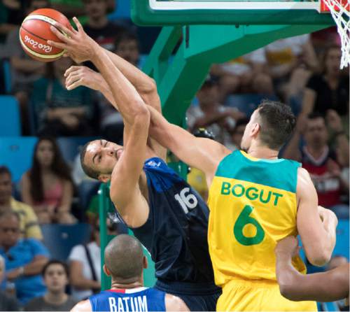 Rick Egan  |  The Salt Lake Tribune

Rudy Gobert (16) of France,goes for a rebound along with Andrew Bogut (6) of Australia, in Olympic Basketball action in Rio de Janeiro, Friday, August 5, 2016.