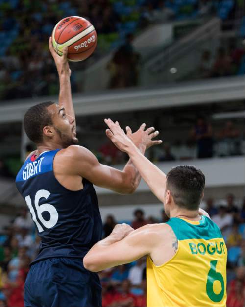 Rick Egan  |  The Salt Lake Tribune

Rudy Gobert (16) of France, shoots over Andrew Bogut (6) of Australia, in Olympic Basketball action in Rio de Janeiro, Friday, August 5, 2016.