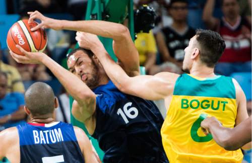 Rick Egan  |  The Salt Lake Tribune

Rudy Gobert (16) of France,goes for a rebound along with Andrew Bogut (6) of Australia, in Olympic Basketball action in Rio de Janeiro, Friday, August 5, 2016.
