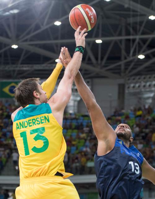 Rick Egan  |  The Salt Lake Tribune

David Andersen (13) of Australia shoots over Boris Diaw (13) of France, in Olympic Basketball action in Rio de Janeiro, Friday, August 5, 2016.