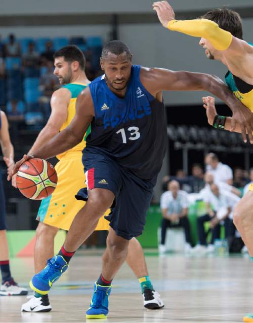 Rick Egan  |  The Salt Lake Tribune

Boris Diaw (13) of France takes the ball inside as David Andersen (13) of Australia defends, in Olympic Basketball action in Rio de Janeiro, Friday, August 5, 2016.