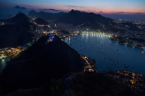 Rick Egan  |  The Salt Lake Tribune

Christ The Redeemer glows in the back ground, as the sun sets in Rio de Janeiro, Thursday, August 4, 2016.