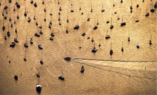 Rick Egan  |  The Salt Lake Tribune

Boats float in the late afternoon sun in Enseada de Botafogo in Rio de Janeiro, Thursday, August 4, 2016.