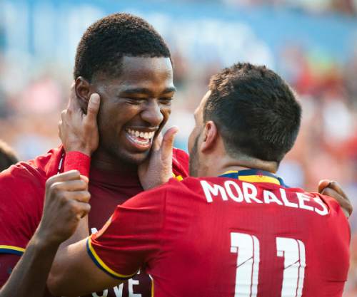 Michael Mangum  |  Special to the Tribune

Real Salt Lake midfielder Javier Morales (11) congratulates forward Olmes Garcia (80) on his first-half goal during their MLS match against the Chicago Fire at Rio Tinto Stadium in Sandy, Utah on Saturday, August 6th, 2016.