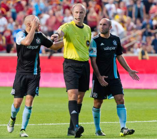 Michael Mangum  |  Special to the Tribune

Chicago Fire defender Eric Gehrig (6), left, argues with the referee Silviu Petrescu after calling for a penalty kick after Gehrig fouled Real Salt Lake forward Juan Manuel Martinez in the box during their MLS match at Rio Tinto Stadium in Sandy, Utah on Saturday, August 6th, 2016.