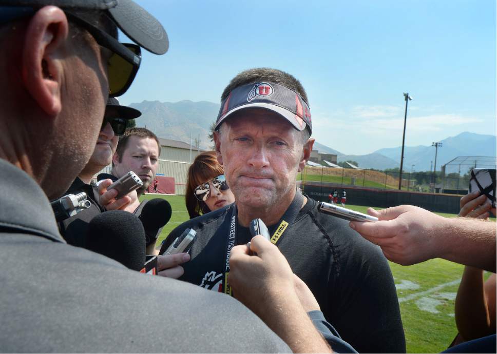 Scott Sommerdorf   |  The Salt Lake Tribune  
Utah head coach Kyle Whittingham listens to questions from a group of reporters after practice, Thursday, August 4, 2016.