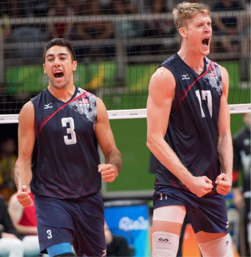 Rick Egan  |  The Salt Lake Tribune

Taylor Sander (3) and Maxwell Holt (17) of the United States, celebrate as the US team tries to rally to catch Canada in Men's Olympic volleyball action. United States vs. Canada,  at Ginásio do Maracanãzinho, in Rio de Janeiro, Sunday, August 7, 2016.