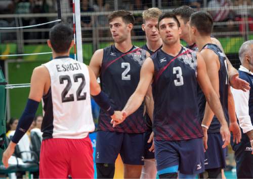 Rick Egan  |  The Salt Lake Tribune

Erik Shoji (22), Aaron Russell (2) and Taylor Sander (3) of United States after losing to Canada in Men's Olympic volleyball action, at Ginásio do Maracanãzinho, in Rio de Janeiro, Sunday, August 7, 2016.