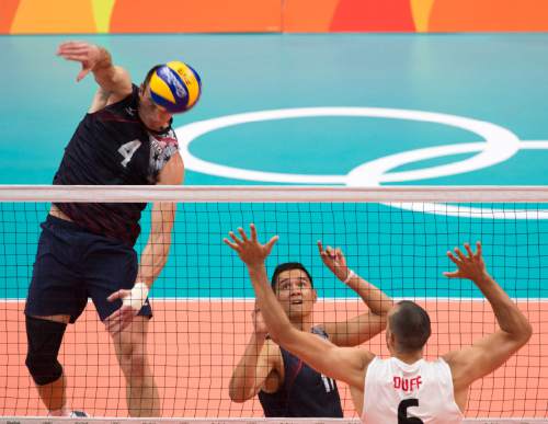 Rick Egan  |  The Salt Lake Tribune

David Lee (4), hits the ball for the United States, in men's volleyball, at Ginásio do Maracanãzinho, in Rio de Janeiro, Sunday, August 7, 2016.
