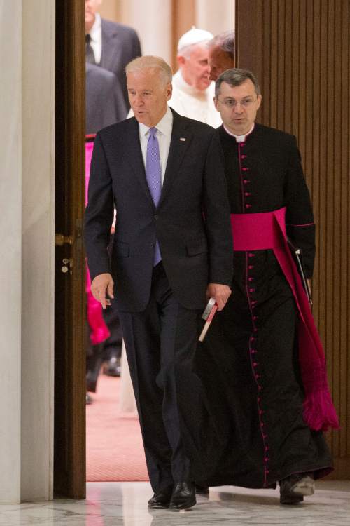 US Vice President Joe Biden enters the Pope Paul VI hall at the Vatican, to take part at  a congress on the progress of regenerative medicine and its cultural impact,,  Friday, April 29, 2016. (AP Photo/Andrew Medichini)