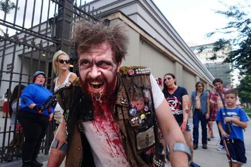 Lennie Mahler  |  The Salt Lake Tribune

Zombies take to the streets in the 9th annual SLC Zombie Walk in downtown Salt Lake City, Sunday, Aug. 7, 2016.