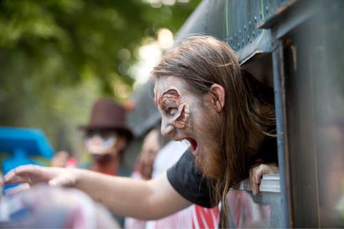 Lennie Mahler  |  The Salt Lake Tribune

Zombies gather at Washington Square after to the 9th annual SLC Zombie Walk in downtown Salt Lake City, Sunday, Aug. 7, 2016.