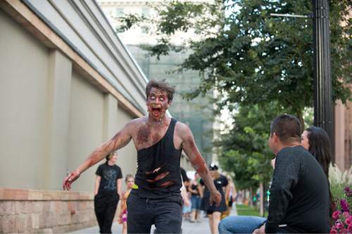 Lennie Mahler  |  The Salt Lake Tribune

Zombies take to the streets in the 9th annual SLC Zombie Walk in downtown Salt Lake City, Sunday, Aug. 7, 2016.