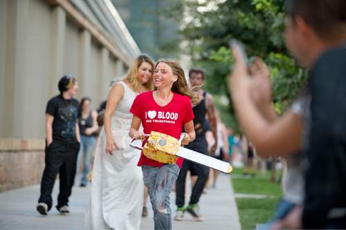 Lennie Mahler  |  The Salt Lake Tribune

Zombies take to the streets in the 9th annual SLC Zombie Walk in downtown Salt Lake City, Sunday, Aug. 7, 2016.