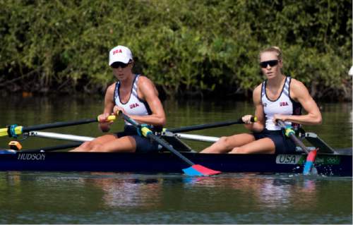 Rick Egan  |  The Salt Lake Tribune

Devery Karz (left) and Kathleen Bertko rest after crossing the finish line in first place in their heat, in the Lightweight Women's Double Sculls, qualifying them to advance to the semifinals for the USA, at Lagoa Stadium, in Rio de Janeiro, Tuesday, August 9, 2016.