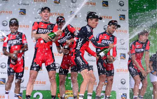 Scott Sommerdorf   |  The Salt Lake Tribune  
The riders of the BMC Racing Team douse the crowd with champagne after winning the team competition at the Tour of Utah, Sunday, August 7, 2016.