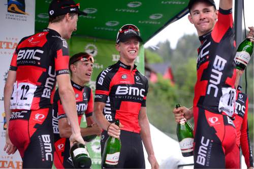 Scott Sommerdorf   |  The Salt Lake Tribune  
Utah local Taylor Eisnehart, center, smiles as he and the rest of the BMC Racing Team celebrate their team win in the Tour of Utah, Sunday, August 7, 2016.