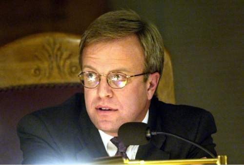 |  Tribune File Photo

Eric Jergensen of the Salt Lake City Council listens to comments Tuesday October 14, 2003, regarding Nordstrom's potential move to Gateway Mall were discussed.