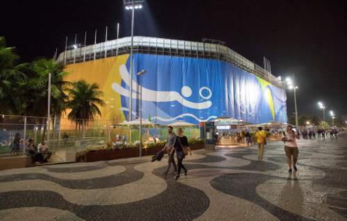 Rick Egan  |  The Salt Lake Tribune

Crowds walk on the famous Copacabana sidewalk, outside the Beach Volleyball Arena near midnight, in Rio de Janeiro, Sunday, August 7, 2016.