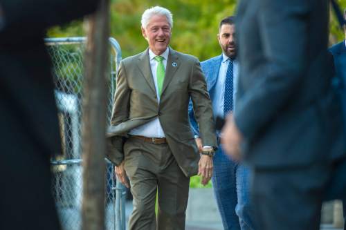 Chris Detrick  |  The Salt Lake Tribune
Former President Bill Clinton greets members of the public after participating in a nonpartisan roundtable discussion at the downtown Salt Lake City offices of Kem Gardner Thursday August 11, 2016.