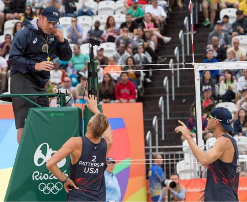 Rick Egan  |  The Salt Lake Tribune

Casey Patterson and Jake Gibb, discuss a controversial play where the point for the USA was taken away after a challenge by Spain, in beach volleyball action, USA vs. Spain, at the Beach Volleyball Arena, in Rio de Janeiro, Wednesday, August 10, 2016.