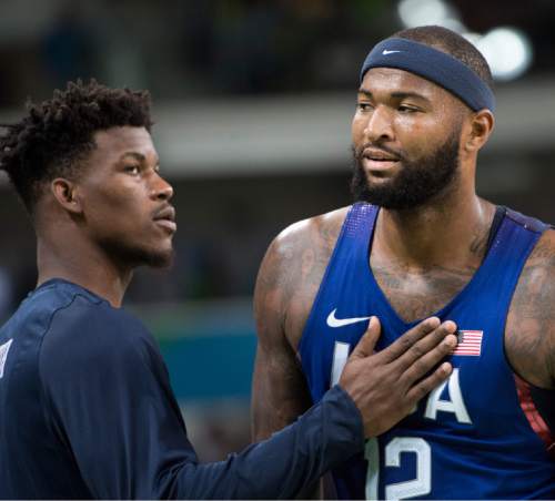 Rick Egan  |  The Salt Lake Tribune

Jimmy Butler (4) consuls Demarcus Cousins (12) of United States as he leaves the game with his fourth personal foul. Cousins was in foul trouble most of the game, in Olympic basketball action, USA vs. Australia,  in Rio de Janeiro, Wednesday, August 10, 2016.
