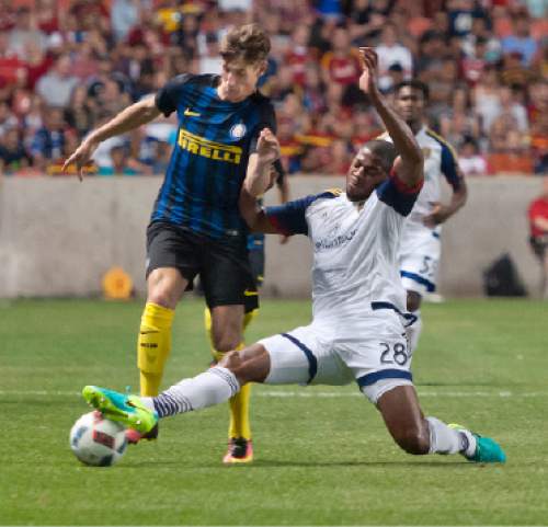 Michael Mangum  |  Special to the Tribune

Real Salt Lake defender Chris Schuler (28) slide tackles Inter Milan forward Andrea Pinamonti (99) during their international friendly at Rio Tinto Stadium in Sandy, Utah on Tuesday, July 19th, 2016. Inter won on a last second goal 2-1.