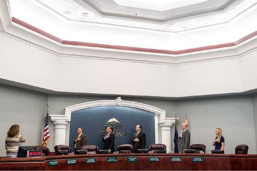 Trent Nelson  |  The Salt Lake Tribune
The West Jordan city council stands for the Pledge of Allegiance at the start of their meeting, Wednesday August 10, 2016. From left, City Clerk Melanie Briggs, Dick Burton, Mayor Kim Rolfe, Chad Nichols, Zach Jacob, Sophie Rice.