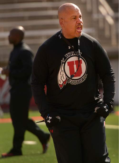 Leah Hogsten  |  The Salt Lake Tribune
Guy Holliday, University of Utah football receivers coach, runs through drills with players Saturday, March 26, 2016 at Rice-Eccles Stadium. Holliday, 50, is the only newcomer to Utah's football coaching staff this year and takes over a unit with less proven talent and experience as the Utes lose their top three receiving yard leaders and replace quarterback Travis Wilson.