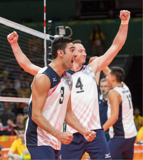 Rick Egan  |  The Salt Lake Tribune

Taylor Sander (3) and David Lee (4) of United States celebrate as the US team closes in on a win in game 4, in volleyball action USA vs. Brazil, in Rio de Janeiro, Thursday, August 11, 2016.
