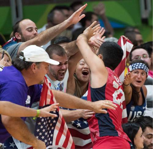 Rick Egan  |  The Salt Lake Tribune

Erik Shoji (22) of United States celebrates with fans, as USA defeated Brazil in volleyball action USA vs. Brazil, in Rio de Janeiro, Thursday, August 11, 2016.