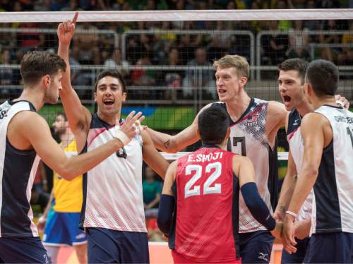 Rick Egan  |  The Salt Lake Tribune

Taylor Sander (3) and the United States team celebrate as after a big point in game 3, in volleyball action USA vs. Brazil, in Rio de Janeiro, Thursday, August 11, 2016.