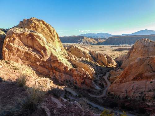 Erin Alberty  |  The Salt Lake Tribune

The Burr Trail winds up the Waterpocket Fold and into the morning sun Oct. 5, 2015 in Capitol Reef National Park.