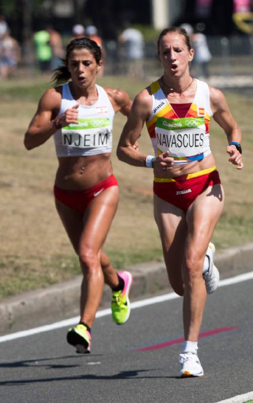 Rick Egan  |  The Salt Lake Tribune

Chirine Njeim, Lebanon, runs alongside Estela Navascues, Spain, in the Women's Marathon, in Rio de Janeiro Brazil, Sunday, August 14, 2016.