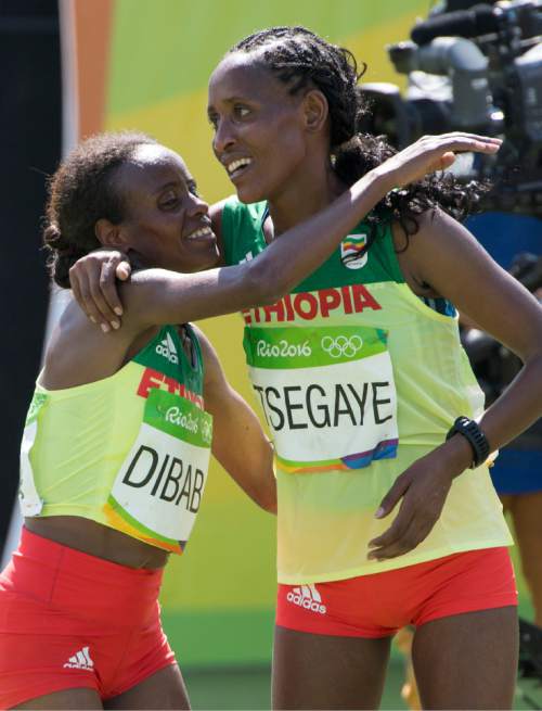 Rick Egan  |  The Salt Lake Tribune


Bronze medalist Mare Dibaba, Ethiopia, hugs Tirfi Tsegaye, who finished forth, 
in the women's Marathon, in Rio de Janeiro Brazil, Sunday, August 14, 2016.