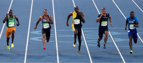 Rick Egan  |  The Salt Lake Tribune

Usain Bolt makes history with his third successive Olympic 100m gold medal as he wins the mens 100m at The Olympic Stadium in Rio de Janeiro, Sunday, August 14, 2016.