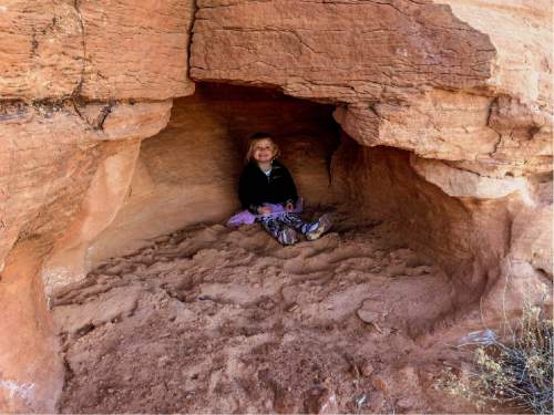 Erin Alberty  |  The Salt Lake Tribune

A young hiker finds a hiding spot on Dec. 1, 2015 near Lower Aztec Butte in Canyonlands National Park.