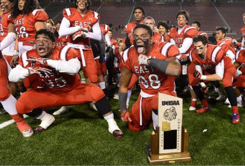 Scott Sommerdorf   |  The Salt Lake Tribune
East players do the Haka with the 4A trophy after East beat Timpview 49-14 for the Utah 4A championship, Friday, November 20, 2015.