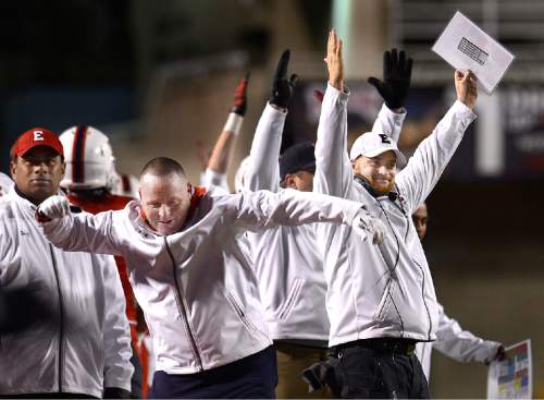 Scott Sommerdorf   |  The Salt Lake Tribune
East coaches including head coach Brandon Matich celebrate another TD that put the game further out of reach for Timpview. East had just scored their 41st point. East beat Timpview 49-14 for the Utah 4A championship, Friday, November 20, 2015.