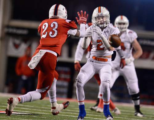 Scott Sommerdorf   |  The Salt Lake Tribune
East's Saia Hamilton (24) breaks up a pass intended for Timpview's Sterling Evans (2) during second half play. East beat Timpview 49-14 for the Utah 4A championship, Friday, November 20, 2015.