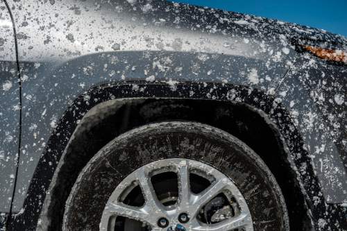 Chris Detrick  |  The Salt Lake Tribune
A salt-covered SUV during Speed Week at the Bonneville Salt Flats Saturday August 13, 2016.