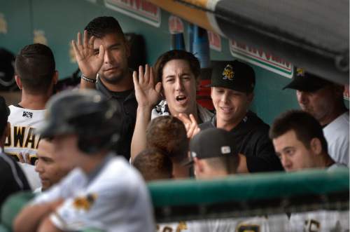 Scott Sommerdorf   |  The Salt Lake Tribune  
Salt lake Bees starting pitcher Tim Lincecum joins team mates in the Bees dugout as they congratulate RF Todd Cunningham on his first inning 3-run home run that knotted the score at 3-3. Lincecum had a rough start, giving up a home run and an early 3-0 lead in the top of the first to the Round Rock Express in his first start in Salt Lake for the Salt Lake Bees, Monday, August 15, 2016.