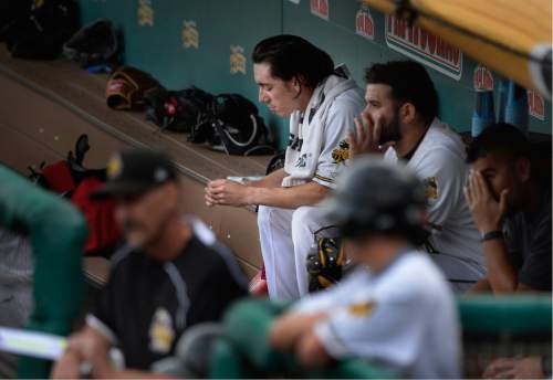 Scott Sommerdorf   |  The Salt Lake Tribune  
Former San Francisco Giants and Los Angeles Angels pitcher Tim Lincecum sits in the Bees dugout as the Bees hit in the first. Lincecum had a rough first inning giving up two HRs and a 3-0 lead as he made his first start in Salt Lake for the Salt Lake Bees, Monday, August 15, 2016.